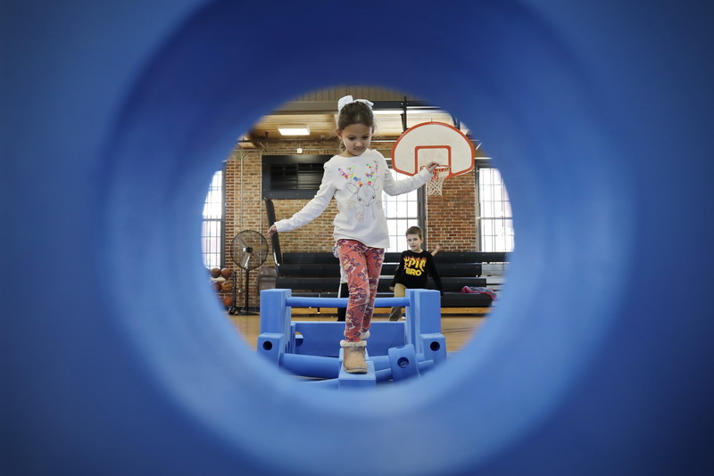 Gabriella Rivera, 6  navigates an obstacle course that she and other children made from foam blocks at the Andrew McCoy Recreation Center on Hillman Street in New Bedford, MA as part of February Staycation Fun Weeks  activities organized by the Department of Parks, Recreation and Beaches.  .  PHOTO PETER PEREIRA