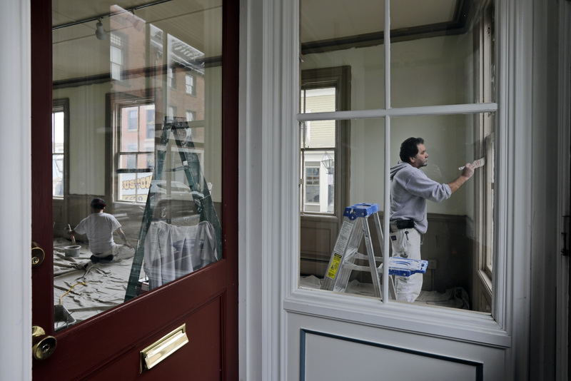 Joseph Machado, owner of Supreme Painting,  and his staff paint the interior of a show space on N Water Street in downtown New Bedford., MA.  PHOTO PETER PEREIRA