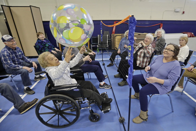 Pauline Faria, 95, joins fellow seniors in playing sitting volleyball, at the Wareham Council on Aging inside the Multi-Service Center on Route 6 in Wareham, MA.     PHOTO PETER PEREIRA