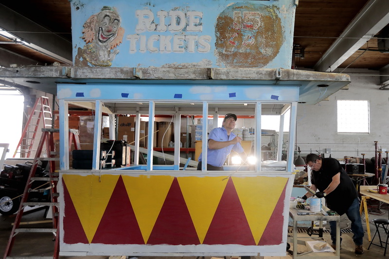 New Bedford city carpenters, Scott Cunha, left, and John Pereira (no relation to photog), restore an old Lincoln Park ticket booth, which was donated to the city by a private party, to be used at a future attraction in the south end of New Bedford, MA.   PHOTO PETER PEREIRA