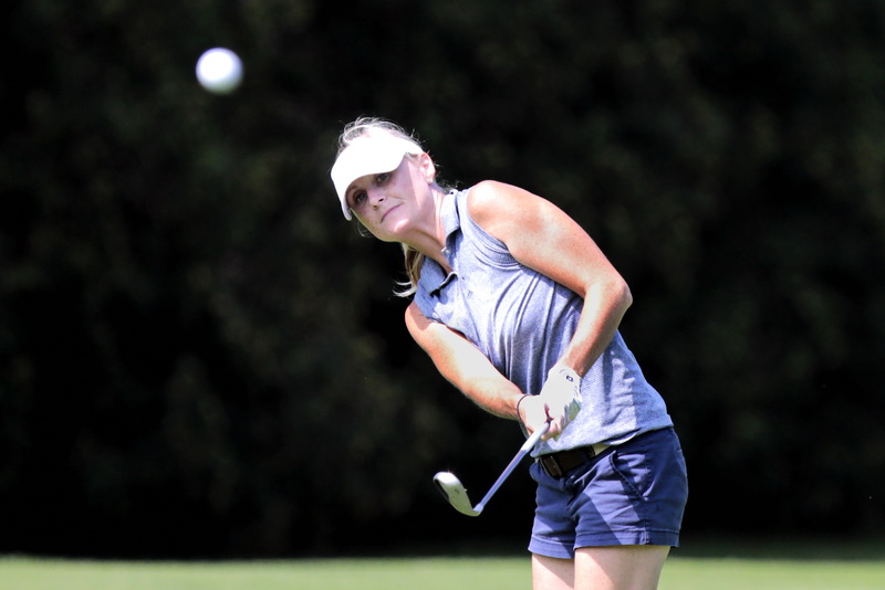 Erin McDonough keeps her eye on the ball, as she pitches it onto the green on day one of the Country Club of New Beford Women's Fourball.    PHOTO PETER PEREIRA