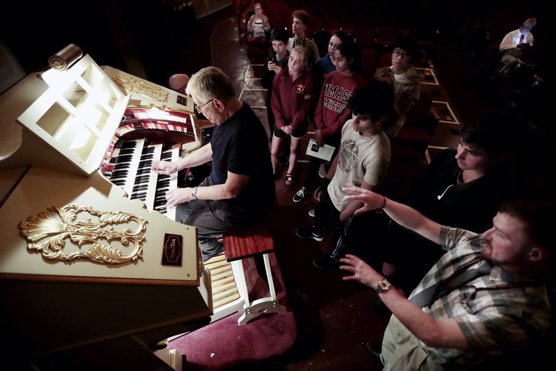 Ed Wawrzynowicz of the American Theater Organ Society, demonstrates the capabilities of the Mighty Wurlitzer pipe organ at the Zeiterion Theater in New Bedford, to students of the Sharon High School film club.  These types of organs were designed to replace an entire orchestra during the Vaudeville era.  PHOTO PETER PEREIRA
