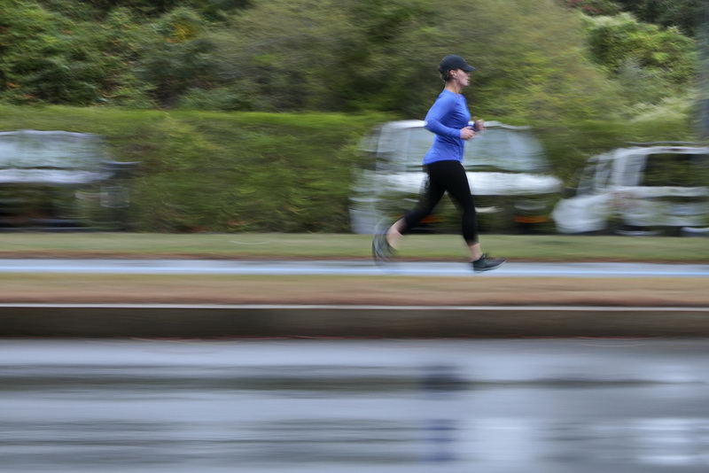 A runner doesn't let the weather slow her down, as she zooms around Fort Taber Park in the south end of New Bedford, MA for a morning run. 