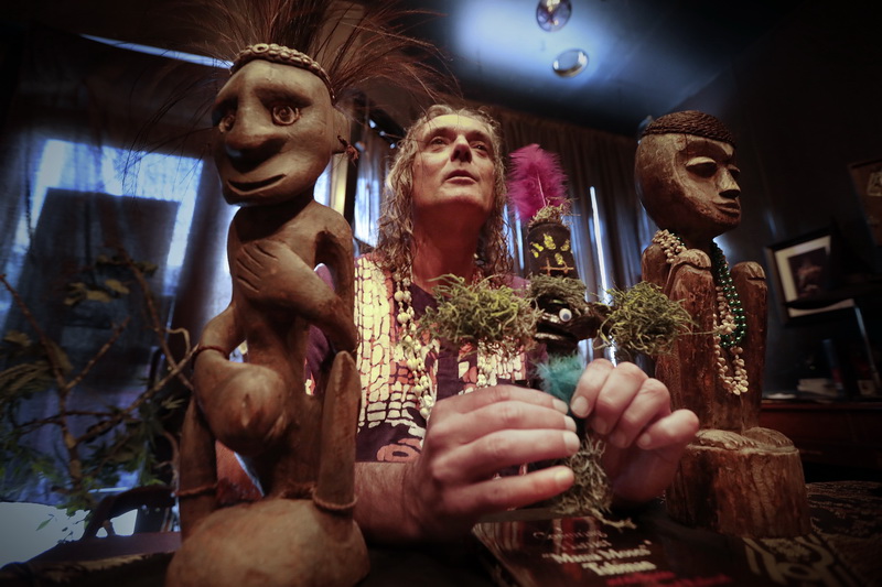 Utu the witch doctor, holds a voodoo doll he made for protecting a household in preparation to teaching a class on making a voodoo doll and a mojo bag, during  a session at Sanctum Folklorica on Purchase Street in downtown New Bedford, MA.  PHOTO PETER PEREIRA