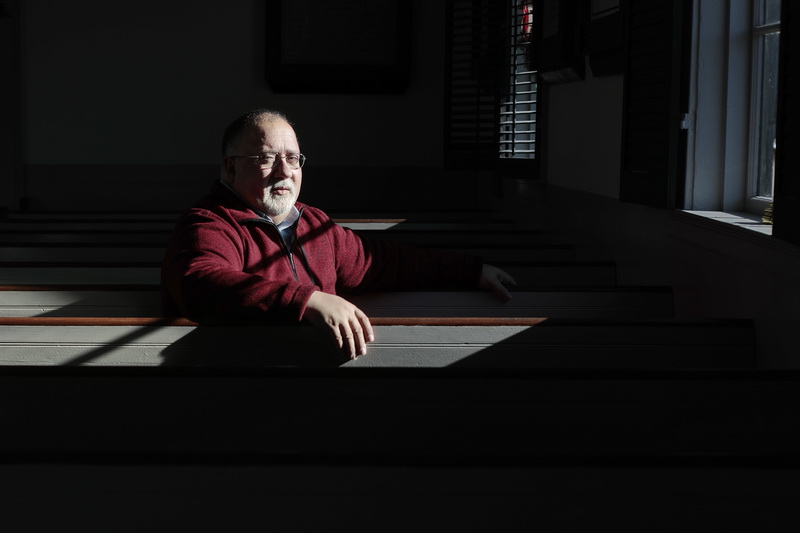 Rev. David Lima inside of the Seamen's Bethel in downtown New Bedford, MA.   PHOTO PETER PEREIRA