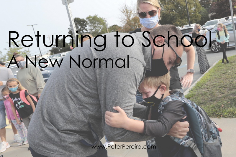 Students make their way into the Leroy Wood School in Fairhaven, MA for the first day of school.  This is the first time that students have been allowed back to the school since March. PHOTOS PETER PEREIRA