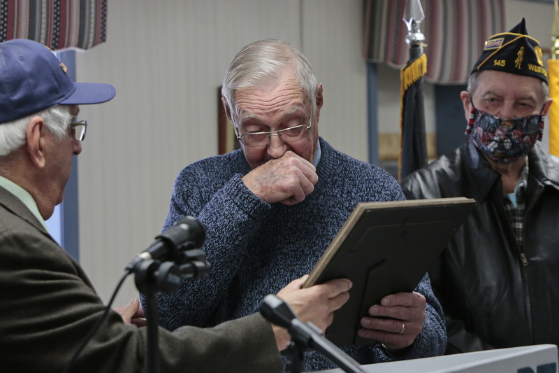 Russel T. Hart becomes emotional after receiving a citation from Senior Vice-Commander, Tony Vieira, honoring him for fifty years of continuous membership at the Westport American Legion Post 145. PHOTO PETER PEREIRA