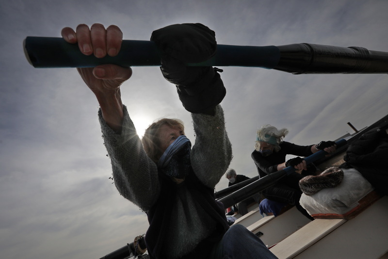 (l to r) Jean West, Mary Comtois and Alexandra Heavey put in a race pace session, as they and fellow members of the Buzzards Bay Rowing Club go for their bi-weekly row in New Bedford, MA harbor.  PHOTO PETER PEREIRA