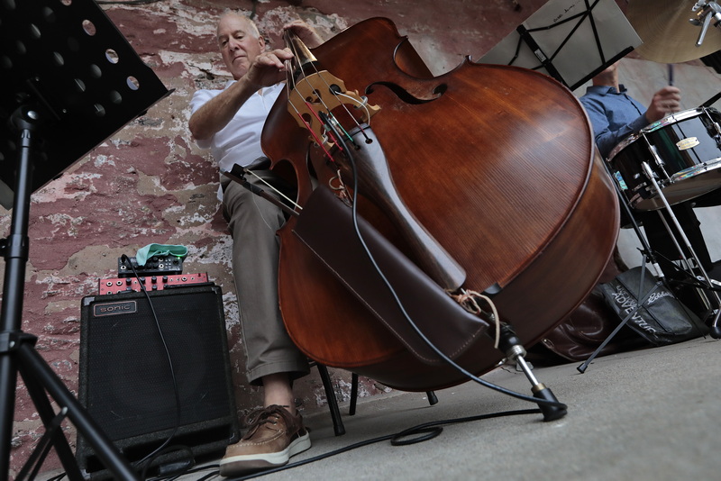 Alan Bernstein plays his double base during live performance in front of Whaling City Sound, as AHA! hosts its first in person event in downtown New Bedford since March of 2020. PHOTO PETER PEREIRA