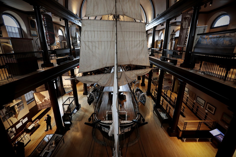 A visitor takes in the splendor of the half scale replica of the whaling ship Lagoda inside of the Whaling Museum in New Bedford, MA.