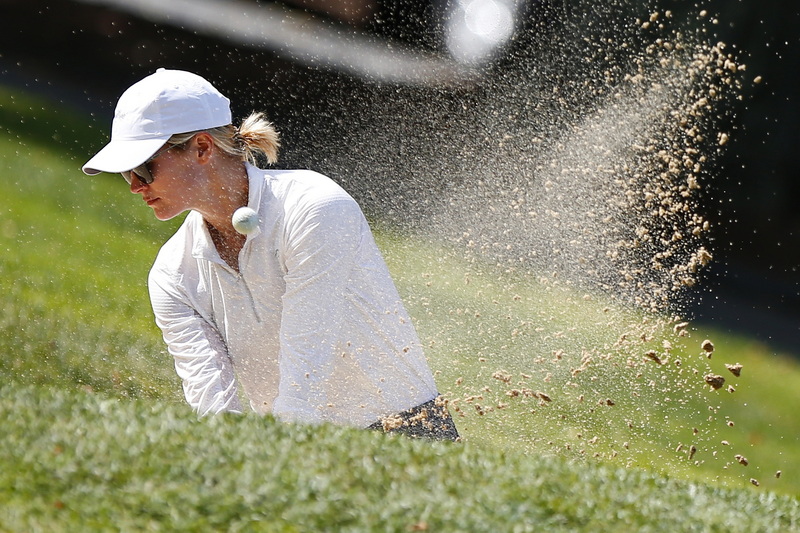 Isabel Englsted pitches out of the sand trap at the 43rd Annual Country Club of New Bedford Women's Invitational Four-Ball.  PHOTO PETER PEREIRA