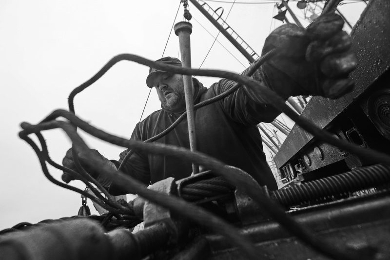 Hans Bendiksen of Reidar's Trawl Gear & Marine Supply splices a steel cable for the dredges of a scalloper docked in New Bedford, MA.