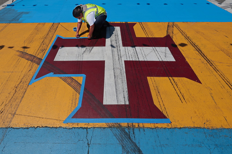 A.J. Fortes, facilities manager, takes a look at the devestation caused by an overnight fire to the upper level of the Nazarene Christian Academy on Hathaway Road in New Bedford, MA. PHOTO PETER PEREIRA