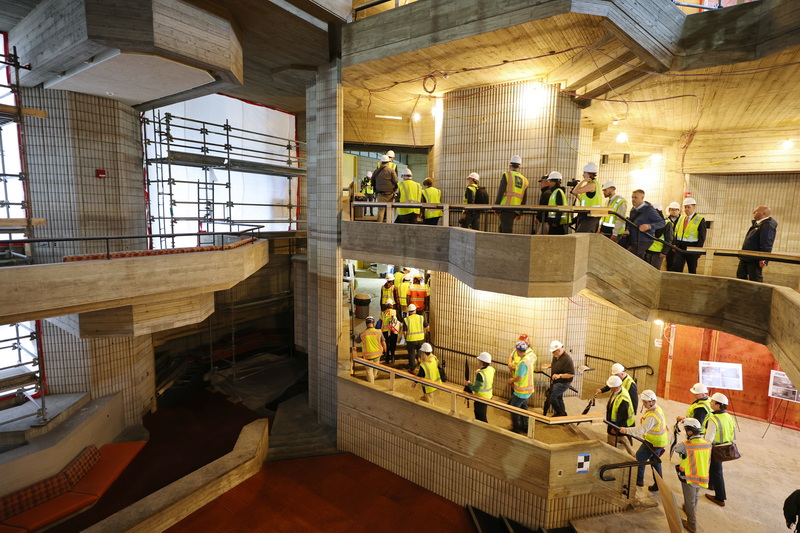 Attendees tour the inside of the UMass Dartmouth Liberal Arts and Sciences (LARTS) building restoration project which is currently underway.  PHOTO PETER PEREIRA