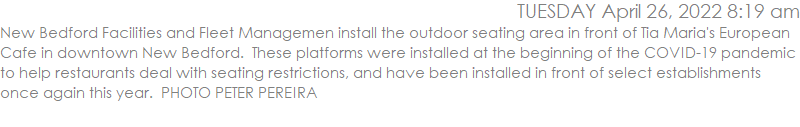 New Bedford Facilities and Fleet Managemen install the outdoor seating area in front of Tia Maria's European Cafe in downtown New Bedford.  These platforms were installed at the beginning of the COVID-19 pandemic to help restaurants deal with seating restrictions, and have been installed in front of select establishments once again this year.  PHOTO PETER PEREIRA