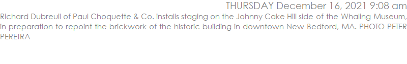 Richard Dubreuil of Paul Choquette & Co. installs staging on the Johnny Cake Hill side of the Whaling Museum, in preparation to repoint the brickwork of the historic building in downtown New Bedford, MA. PHOTO PETER PEREIRA