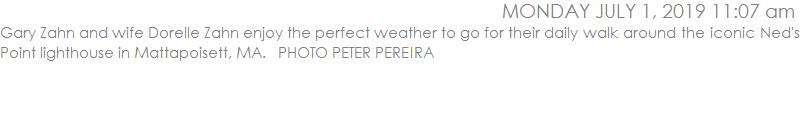 Gary Zahn and wife Dorelle Zahn enjoy the perfect weather to go for their daily walk around the iconic Ned's Point lighthouse in Mattapoisett, MA.   PHOTO PETER PEREIRA