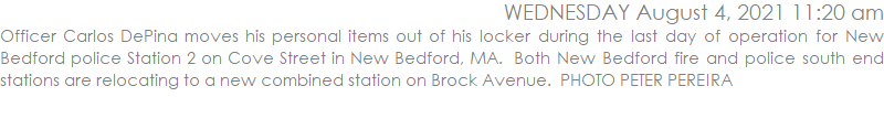 Officer Carlos DePina moves his personal items out of his locker during the last day of operation for New Bedford police Station 2 on Cove Street in New Bedford, MA.  Both New Bedford fire and police south end stations are relocating to a new combined station on Brock Avenue.  PHOTO PETER PEREIRA