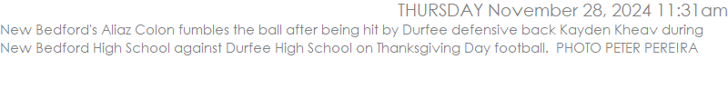 New Bedford's Aliaz Colon fumbles the ball after being hit by Durfee defensive back Kayden Kheav during New Bedford High School against Durfee High School on Thanksgiving Day football.