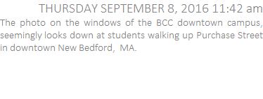 The photo on the windows of the BCC downtown campus, seemingly looks down at students walking up Purchase Street in downtown New Bedford,  MA.