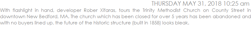 With flashlight in hand, developer Rober Xifaras, tours the Trinity Methodist Church on County Street in downtown New Bedford, MA. The church which has been closed for over 5 years has been abandoned and with no buyers lined up, the future of the historic structure (built in 1858) looks bleak. 