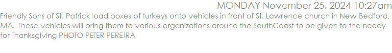 Friendly Sons of St. Patrick load boxes of turkeys onto vehicles in front of St. Lawrence church in New Bedford, MA.  These vehicles will bring them to various organizations around the SouthCoast to be given to the needy for Thanksgiving PHOTO PETER PEREIRA