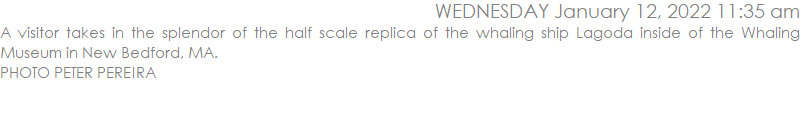 A visitor takes in the splendor of the half scale replica of the whaling ship Lagoda inside of the Whaling Museum in New Bedford, MA.