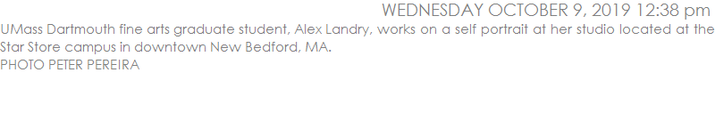 UMass Dartmouth fine arts graduate student, Alex Landry, works on a self portrait at her studio located at the Star Store campus in downtown New Bedford, MA.