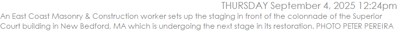 An East Coast Masonry & Construction worker sets up the staging in front of the colonnade of the Superior Court building in New Bedford, MA which is undergoing the next stage in its restoration. PHOTO PETER PEREIRA
