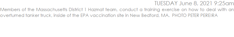 Members of the Massachusetts District 1 Hazmat team, conduct a training exercise on how to deal with an overturned tanker truck, inside of the EPA vaccination site in New Bedford, MA.  PHOTO PETER PEREIRA