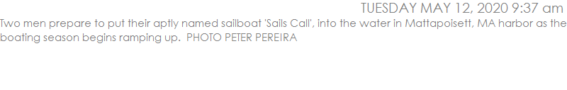 Two men prepare to put their aptly named sailboat 'Sails Call', into the water in Mattapoisett, MA harbor as the boating season begins ramping up.  PHOTO PETER PEREIRA