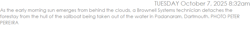 As the early morning sun emerges from behind the clouds, a Brownell Systems technician detaches the forestay from the hull of the sailboat being taken out of the water in Padanaram, Dartmouth. PHOTO PETER PEREIRA