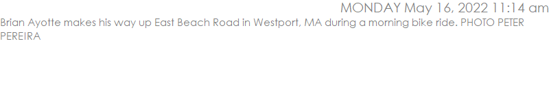 Brian Ayotte makes his way up East Beach Road in Westport, MA during a morning bike ride. PHOTO PETER PEREIRA