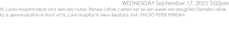St. Lukes Hospital labor and delivery nurse, Renee LaFae carries her seven week old daughter Ophelia LaFae to a demonstration in front of St. Luke Hospital in New Bedford, MA. PHOTO PETER PEREIRA