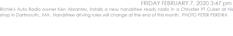 Richie's Auto Radio owner Ken Abrantes, installs a new handsfree ready radio in a Chrystler PT Cuiser at his shop in Dartmouth., MA.  Handsfree driving rules will change at the end of this month.  PHOTO PETER PEREIRA