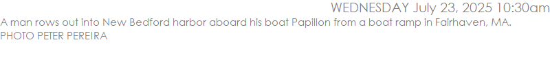 A man rows out into New Bedford harbor aboard his boat Papillon from a boat ramp in Fairhaven, MA. PHOTO PETER PEREIRA