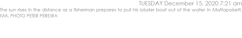 The sun rises in the distance as a fisherman prepares to pull his lobster boat out of the water in Mattapoisett, MA. PHOTO PETER PEREIRA 