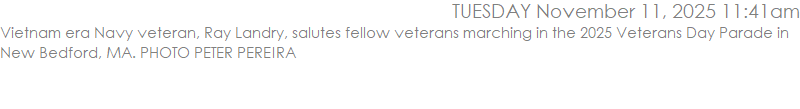 Vietnam era Navy veteran, Ray Landry, salutes fellow veterans marching in the 2025 Veterans Day Parade in New Bedford, MA. PHOTO PETER PEREIRA