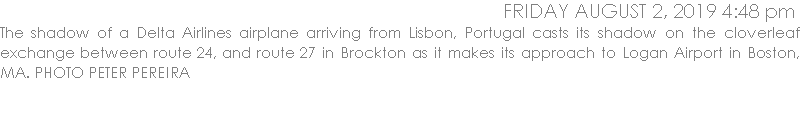 The shadow of a Delta Airlines airplane arriving from Lisbon, Portugal casts its shadow on the cloverleaf exchange between route 24, and route 27 in Brockton as it makes its approach to Logan Airport in Boston, MA. PHOTO PETER PEREIRA