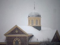 Snow falls on the iconic cupola of the Whaling Museum as a storm sweeps across the region. PHOTOS PETER PEREIRA