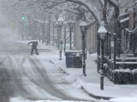 A man shovels the sidewalk on Union Street in downtown New Bedford. PHOTOS PETER PEREIRA