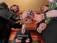 New Bedford City Clerk, Jim Farias, asks David McDonough to place the wedding ring on the hand of Kelly Hayden during their wedding on Valentine's Day at New Bedford City Hall.  PHOTO PETER PEREIRA