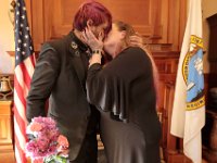 Newlyweds David McDonough and Kelly Hayden kiss for the first time as husband and wife after the couple were married on Valentine's Day in New Bedford City Hall.   PHOTO PETER PEREIRA