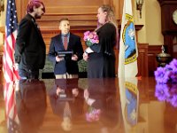 New Bedford City Clerk, Dennis Farias, weds David McDonough and Kelly Hayden on Valentine's Day in New Bedford City Hall.   PHOTO PETER PEREIRA