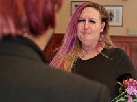 An emotional Kelly Hayden listens to her new husband David McDonough read his vows, as the couple get married inside of New Bedford City Hall on Valentine's Day.  PHOTO PETER PEREIRA