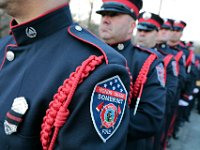 Somerset fire department Honor Guard, lead firefighters from across two states in a line outside of the Hathaway Community Home for Funerals in Somerset, for the wake of Somerset Fire Chief Scott Jepson.   [ PETER PEREIRA/THE STANDARD-TIMES/SCMG ]