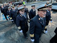 Fairhaven fire chief, Timothy Francis and New Bedford Fire chief Paul Coddere, join firefighters from across two states in a line outside of the Hathaway Community Home for Funerals in Somerset, for the wake of Somerset Fire Chief Scott Jepson.  [ PETER PEREIRA/THE STANDARD-TIMES/SCMG ]