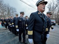 Fairhaven fire chief, Timothy Francis and New Bedford Fire chief Paul Coddere, join firefighters from across two states in a line outside of the Hathaway Community Home for Funerals in Somerset, for the wake of Somerset Fire Chief Scott Jepson.  [ PETER PEREIRA/THE STANDARD-TIMES/SCMG ]