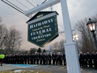 Firefighters from across two states waint in line outside of the Hathaway Community Home for Funerals in Somerset, for the wake of Somerset Fire Chief Scott Jepson.  [ PETER PEREIRA/THE STANDARD-TIMES/SCMG ]