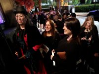 Attendees are decked out in their darkest gear, as they wait to enter the second Annual Whaling City Witches' Ball held at the Tryworks Auditorium of the First Unitarian Church building in downtown New Bedford.  PHOTO PETER PEREIRA